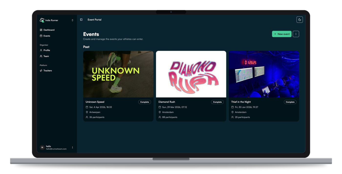 RunnerBeam event portal shown on a MacBook